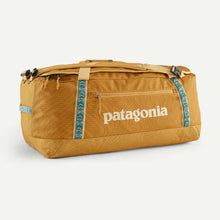 Carica l&#39;immagine nel visualizzatore di Gallery, PATAGONIA Black Hole® Duffel 70L cod. 49348 Pufferfish Gold
