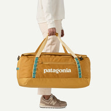 Carica l&#39;immagine nel visualizzatore di Gallery, PATAGONIA Black Hole® Duffel 70L cod. 49348 Pufferfish Gold
